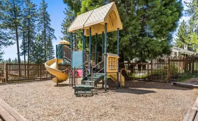 a playground with a slide in a park at LVC0615 - Lake Therapy condo in Zephyr Cove