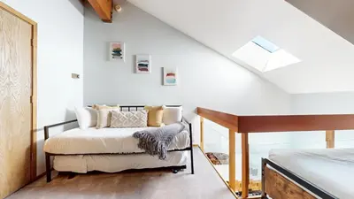 a bedroom with a bed and a window at Snowcreek IV #594 condo in Mammoth Lakes