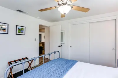 a bedroom with a bed and a ceiling fan at Mtn-View Home with Patio and Grill in Woodlake in Woodlake