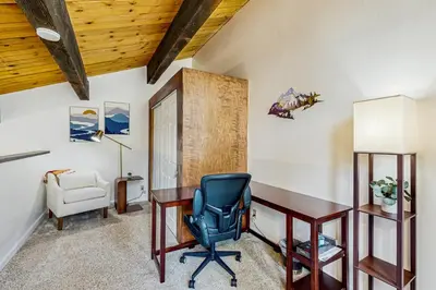an office with a desk and a chair at Lake Tahoe Adventure Base! Townhome with Pool Access in Wood Vista