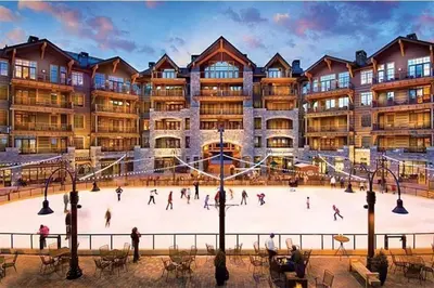 an ice skating rink in front of a building at Spacious 5BDR Lake View Home w Hot Tub Close to Slopes Town Beach in Tahoe City