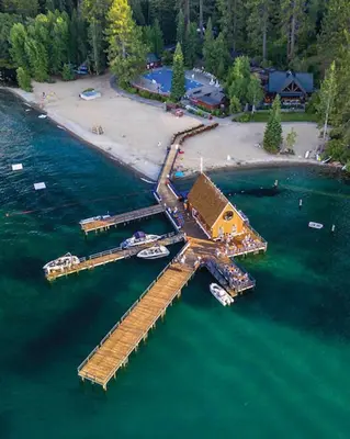 an aerial view of a dock in the water at Spacious 5BDR Lake View Home w Hot Tub Close to Slopes Town Beach in Tahoe City