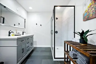 a white bathroom with a sink and a shower at Inspiring Cottage Rental for a Vacation in California Wine Country in Lockeford