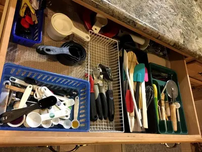 a drawer filled with lots of kitchen utensils at Luxury Cabin Rental with a Fire Pit in Coulterville, California in Coulterville
