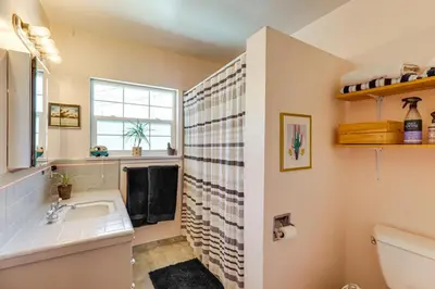 a bathroom with a sink and a toilet at 24 Mi to Slopes! Family Reno Home with Outdoor Oasis in Reno