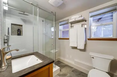 a bathroom with a shower and a toilet and a sink at Near Downhill Ski Resort! Hot Tub Haven in Truckee in Truckee