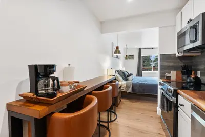 a kitchen and living room with a table and chairs at Experience Zephyr Cove Retreat Relax Enjoy #6 in Zephyr Cove