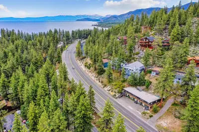 an aerial view of a resort with a road and a lake at Experience Zephyr Cove Retreat Relax Enjoy #6 in Zephyr Cove