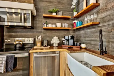 a kitchen with a sink and a stove at First level studio Unit #7 close to everything bike, ski, swim Zephyr Cove! in Zephyr Cove