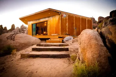 a house on a hill with some rocks at Stunning Lone Pine Accommodation for Romantic Getaways in California in Lone Pine