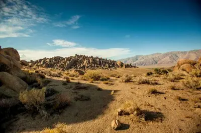 a view of a desert with a mountain in the background at Amazing Lone Pine Cabin for Glamping in California in Lone Pine