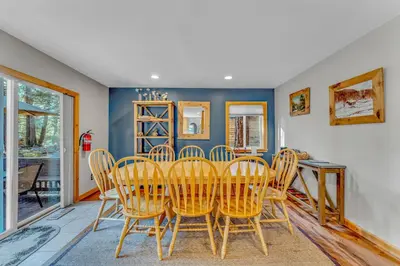 a dining room with a table and chairs at Spacious Pet-Friendly Truckee Retreat with Hot Tub in Truckee