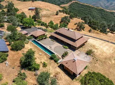 an overhead view of a house with a swimming pool at Priest Ranch with Guest House and Pool in Big Oak Flat