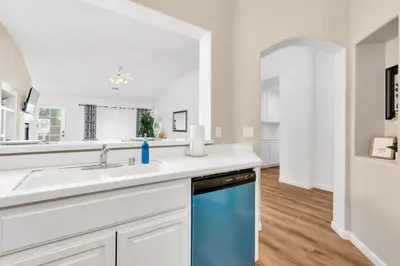 a kitchen with a sink and a dishwasher at University Pastoral - Family Perfect Close to UCM in Merced