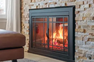 a fireplace with a fire in it at HNC0617 - Stagecoach Summit Retreat condo in Stateline