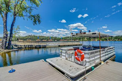 a boat is docked at a dock in the water at Harmony Haven in Groveland