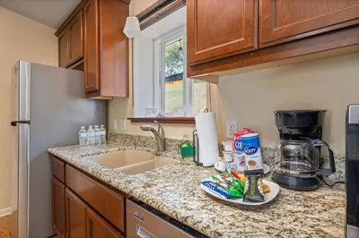 a kitchen with a sink and a counter top at Green Meadows at Sky Ranch, 13 miles from Yosemite in Oakhurst