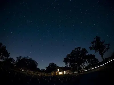 a house at night with the stars in the sky at Exquisite Cottage Rental on Peaceful Vineyard near Bear Valley, California in Angels Camp