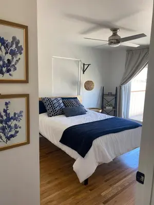 a bedroom with a bed and a ceiling fan at Magical property in the Alabama Hills - HOT TUB in Lone Pine