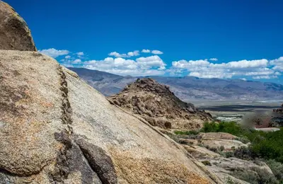a view of the desert from the top of a large rock at Magical property in the Alabama Hills - HOT TUB in Lone Pine