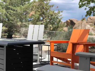 two chairs and a table and chairs on a patio at Magical property in the Alabama Hills - HOT TUB in Lone Pine