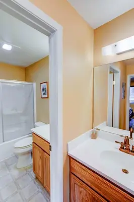 a bathroom with a sink and a toilet and a shower at San Sierra #16 Hot Tub Sauna Near Skiing in Mammoth Lakes