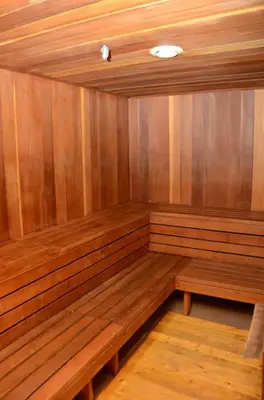 a empty sauna with wooden benches in a room at Aspen Creek #401 Year-Round Outdoor Activities in Mammoth Lakes