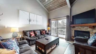 a living room with a couch and a fireplace at Chamonix #70 Near Yearly Outdoor Activities in Mammoth Lakes
