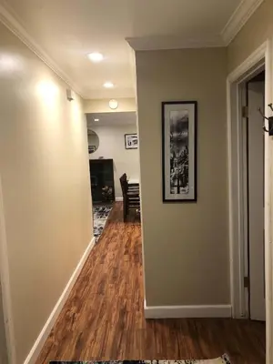 a hallway of a home with wooden floors at Fireside at The Village Near Hike Bike in Mammoth Lakes