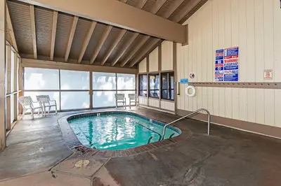 a pool in the middle of a building at Horizons Condo with Communal Clubhouse in Mammoth Lakes