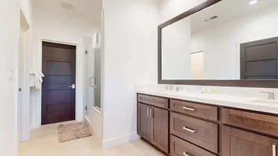 a bathroom with a sink and a mirror at An Adventure of a Lifetime 3 BDR 5 Min to Skiing in Mammoth Lakes