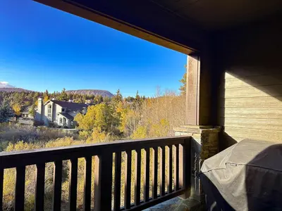 a balcony with a view of a house at An Adventure of a Lifetime 3 BDR 5 Min to Skiing in Mammoth Lakes
