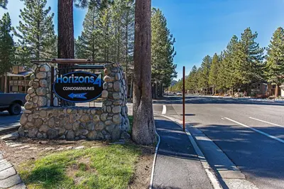 a sign for a horizons campgrounds on the side of a road at Horizons 4 - Walk to Shops & Eateries in Mammoth Lakes