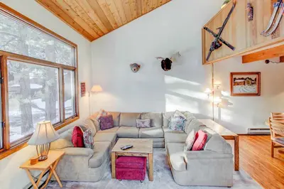 a living room with a couch and a table at Winterset #01 Condo Near Year-Round Fun in Mammoth Lakes