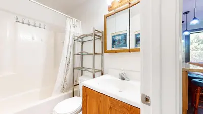 a bathroom with a sink and a toilet and a shower at La Vista Blanc with Year-Round Mammoth Fun in Mammoth Lakes