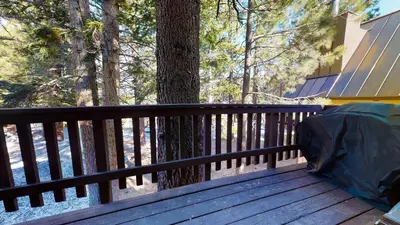a wooden deck with a tent on top of it at Mammoth View Villas - Near Hike & Bike Trails in Mammoth Lakes