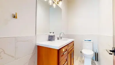 a bathroom with a sink and a toilet at Obsidian Dreaming - On the Sierra Star Golf Course in Mammoth Lakes