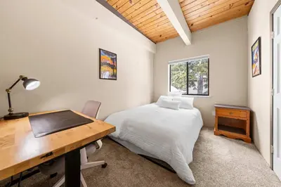 a bedroom with a desk and a bed and a desk and chair at Tahoe City Retreat - For 8 in Tahoe City