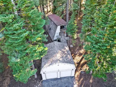an aerial view of a house in the middle of trees at Truckee Cabin Getaway - Sleeps 6 in Truckee