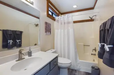 a bathroom with a sink and a toilet and a shower at Valley View Bliss - Nearby Bike Trails & Beach in Olympic Valley