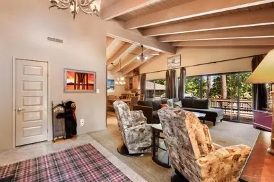 a living room with a couch and chairs at Waters Edge Oasis - Shared Pool & Pier Access in Tahoma