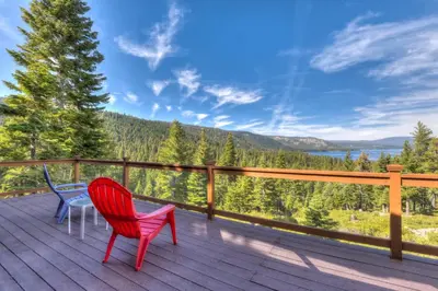 two chairs on a deck with a view at Chamberland Getaway Lake Views with Deck in Tahoma