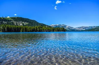 a large body of water with mountains in the background at Chamberland Getaway Lake Views with Deck in Tahoma