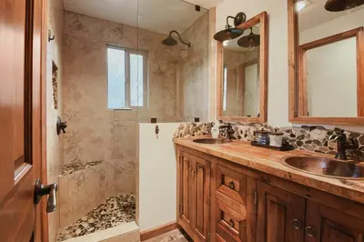 a bathroom with a sink and a shower at Incline Cottage Year-Round Outdoor Fun in Incline Village