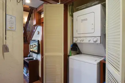 a small laundry room with a washer and dryer at Tahoe City Getaway Minutes from Lake and Activities in Tahoe City