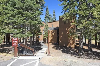 a building with a sign in front of it at A Golden Getaway Pool Hot Tub Tennis & More in Truckee
