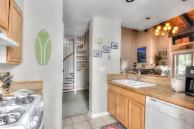 a kitchen with a sink and a dishwasher at Lake Forest Villa Patio w BBQ in Tahoe City