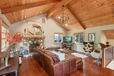 a living room with a couch and a fireplace at Luxury Tahoe Chalet Minutes to Dining in Tahoe Vista