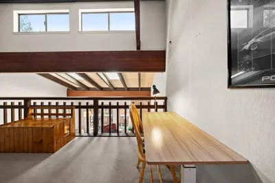 a room with a wooden table and chairs at Mountain Shadows Chalet Tahoe Fun Awaits in Incline Village
