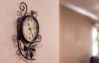 a clock on the side of a wall at Lakeland Getaway - Walk to Lake in South Lake Tahoe